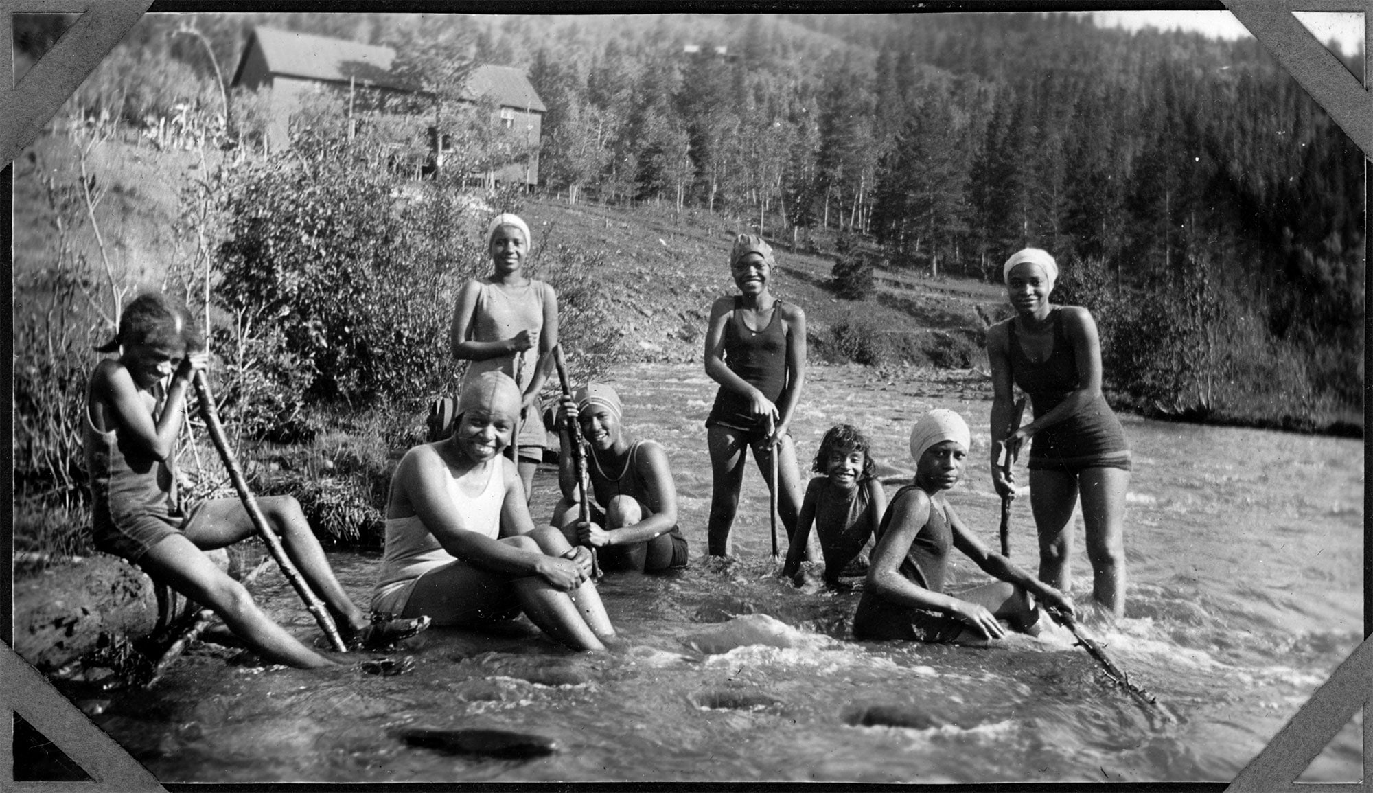 Girls in river in swimsuits