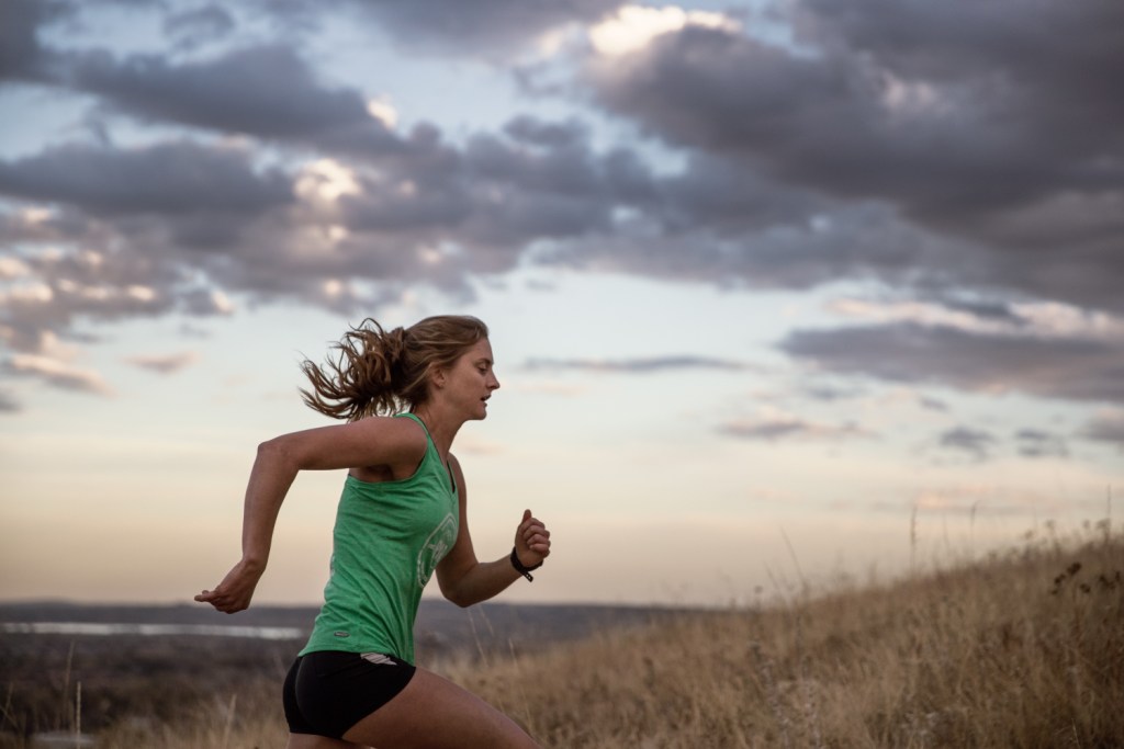 Clare Gallagher running action shot.