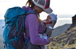 mom hiking with baby in tow