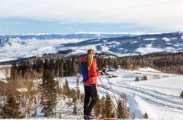 Whitney James cross-country skiing in the mountains.