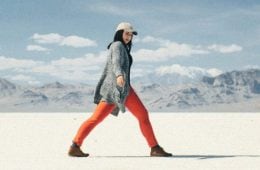 Person walking across desert