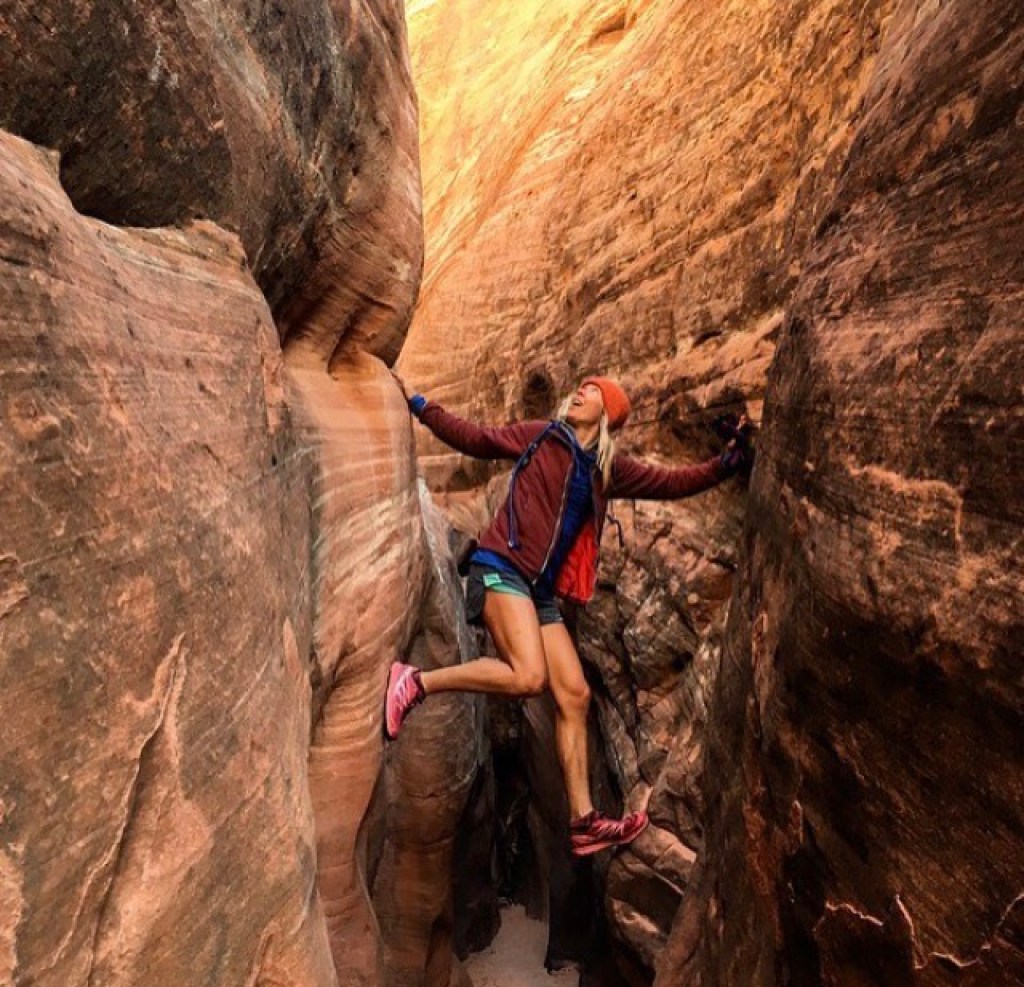 Runner Morgan Sjogren explores a slot canyon