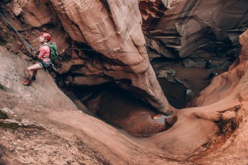 Sarah Herron canyoneering in Moab