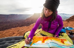 Sarah Uhl works on a watercolor painting in Castle Valley, Utah