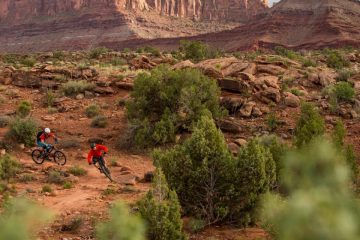 Two mountain bikers enjoy the trails of Moab