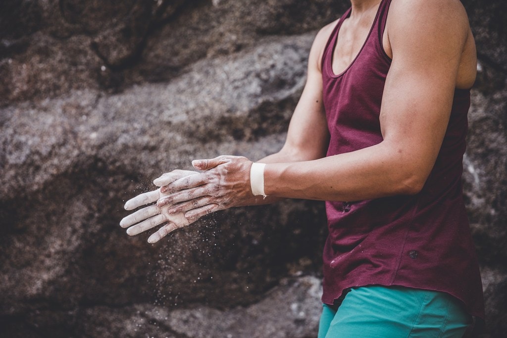 Edwards chalking up before climbing