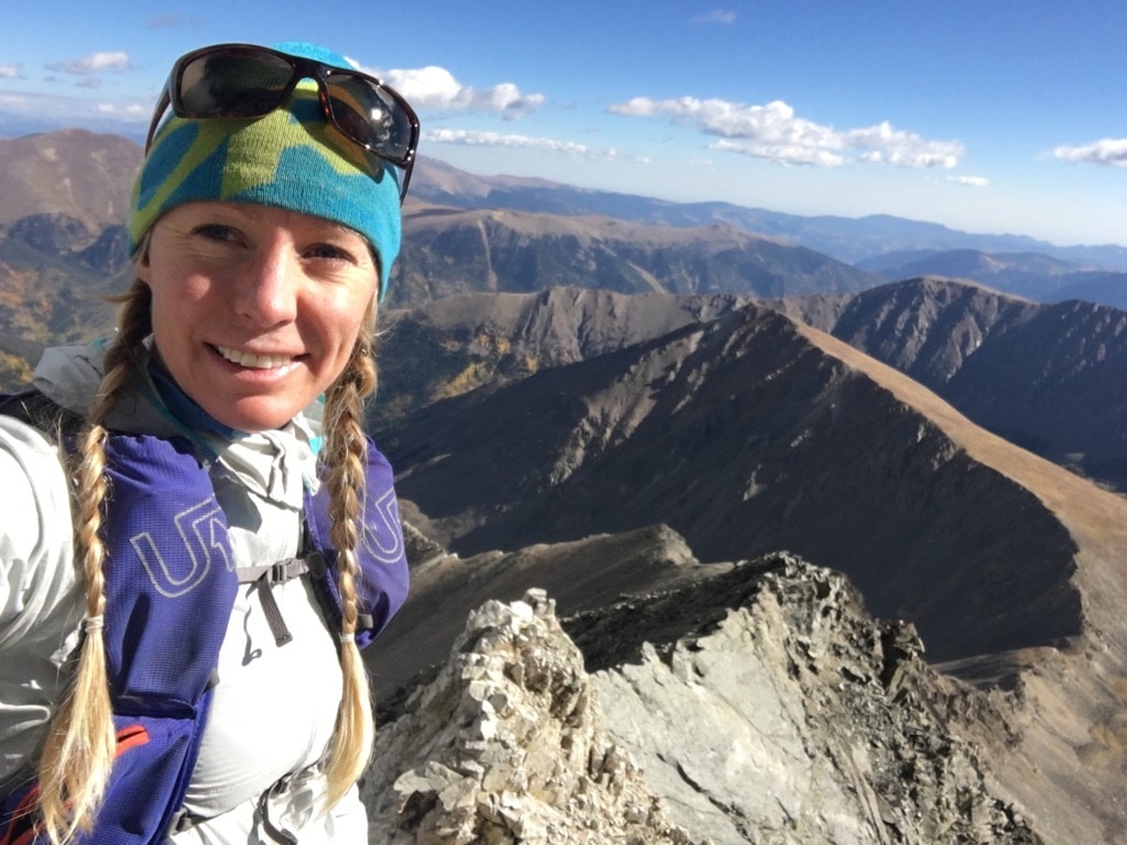 The author on top of a ridgeline in Colorado's Rocky Mountains.