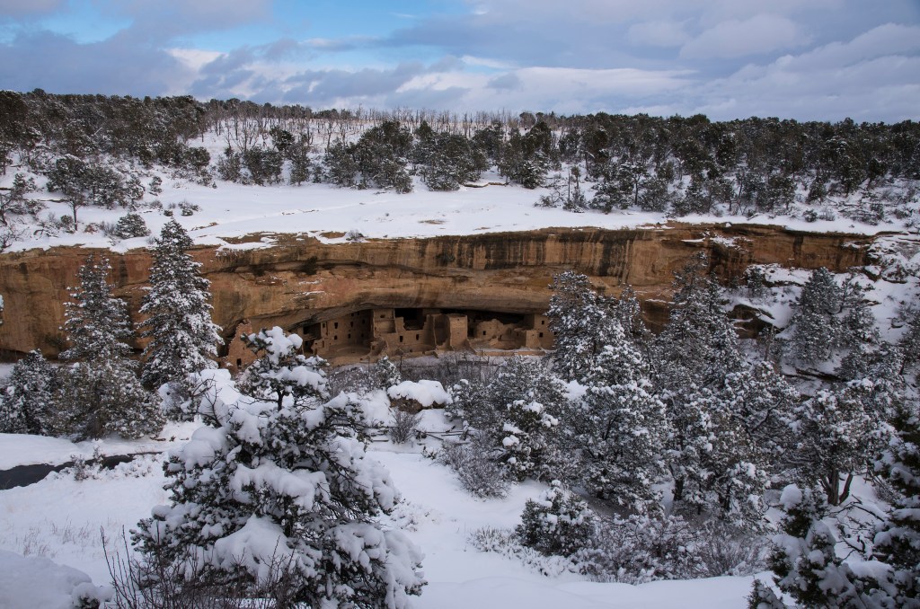 Snow covers the Spruce Tree cliff dwelling.