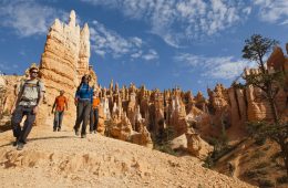 A group hikes in Bryce Canyon National Park.