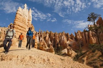 A group hikes in Bryce Canyon National Park.