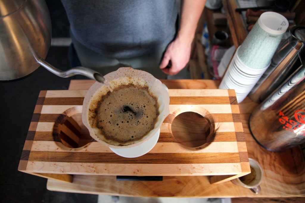 Former pro snowboarder Ralph Backstrom makes coffee.