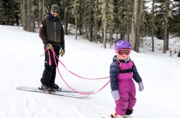 Eloise learns to ski, thanks to a harness, leash and lots of snacks.