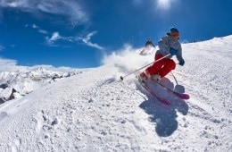 A skier finds fresh powder on Black Crows skis.