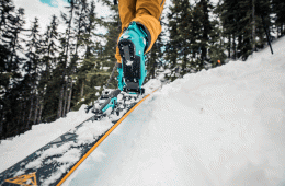 A skier skinning uphill in the Salomon S/LAB Shift Bindings