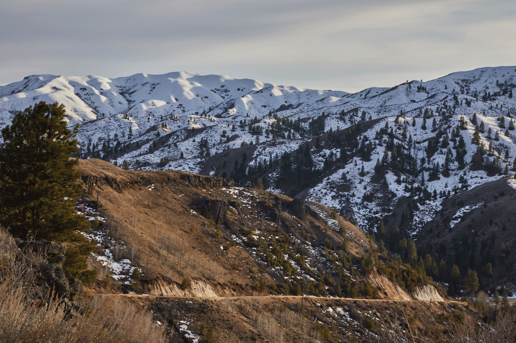 Snow covers the Sawtooth Mountains.