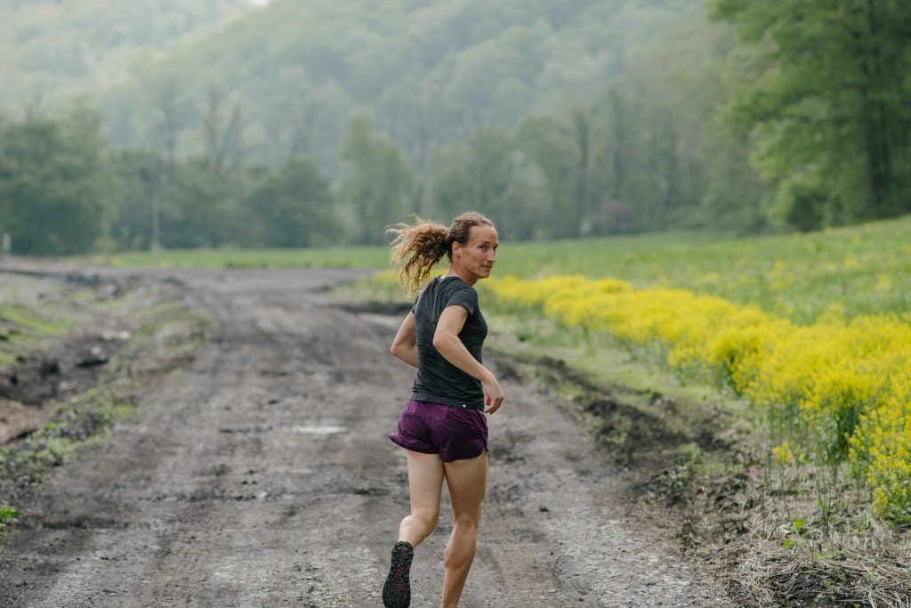 Grace Fisher looks back as she runs near her home outside of Washington, D.C.