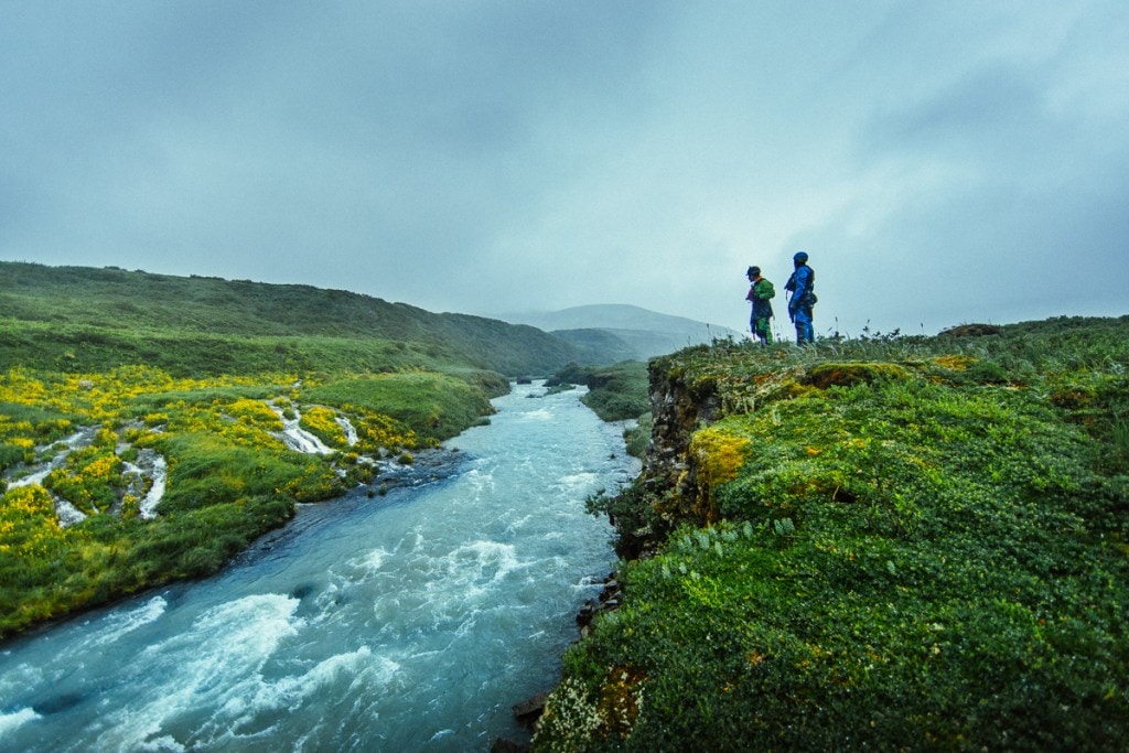 Graham and Shannon assessing river conditions