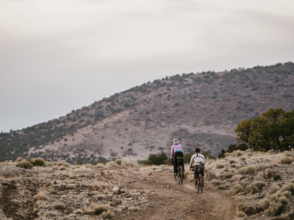 Amanda and Devon ride up the trail to find camp.