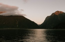 Water with mountains in the background