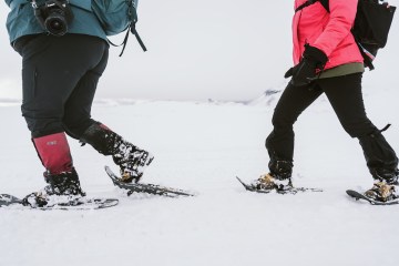 Two people snowshoeing