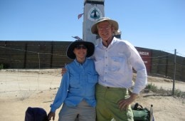 Frodo and Scout (aka: Barney and Sandy Mann) smile at the camera with the arms around each other at the start of the PCT.