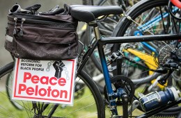 Bicycle with a Peace Peloton sign attached to the rear fender