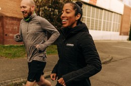 Ashley Davies running with a man next to her