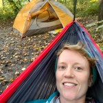 Writer and advocate Meghan McCallum relaxing outside in a hammock