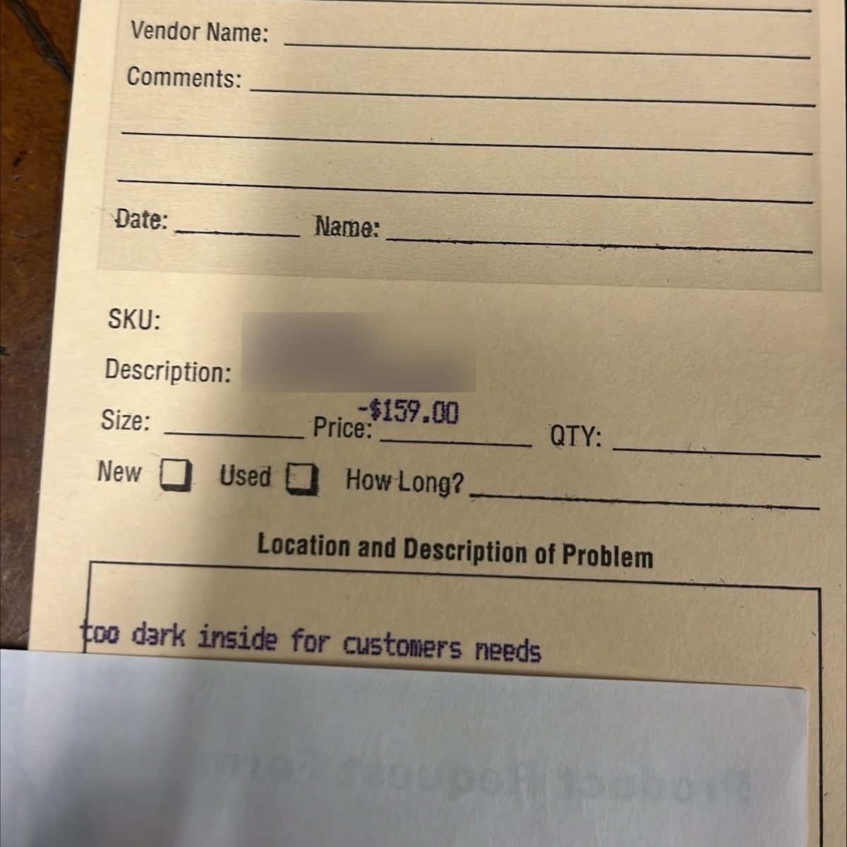 Return tag that reads: "too dark inside for customers needs"