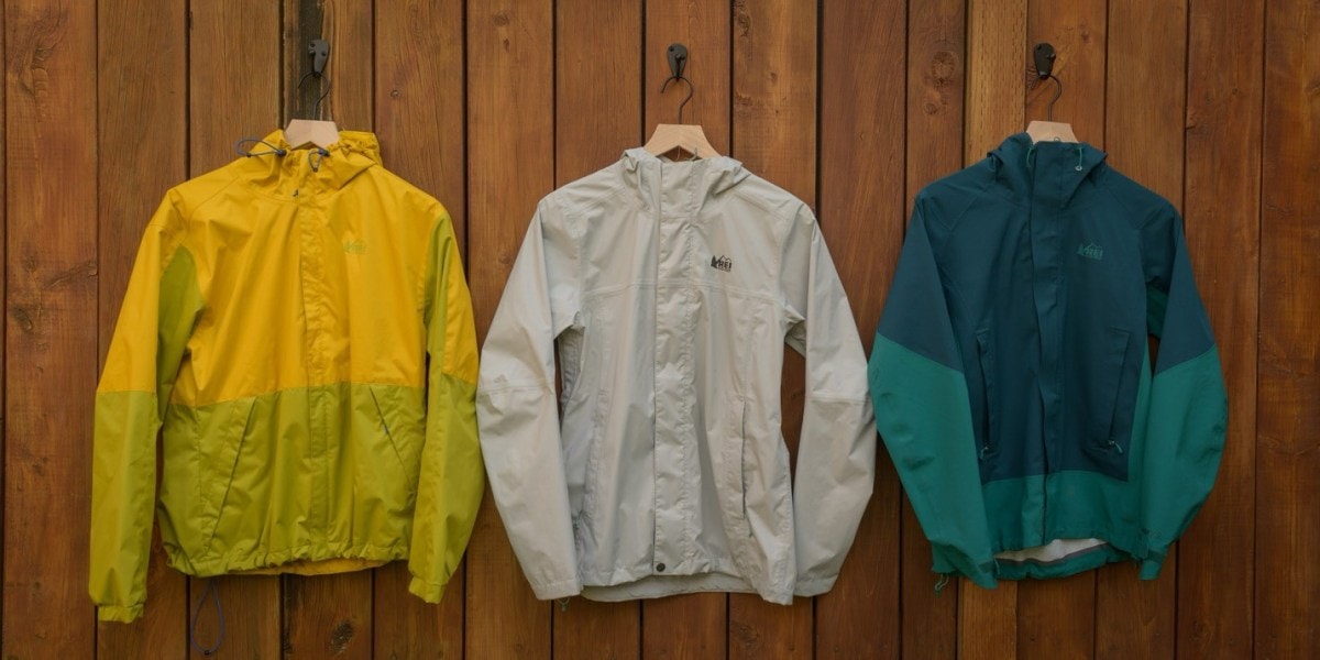 REI Co-op rain jackets, from left to right: the Trailmade Jacket; the Rainier Jacket; the Flash Stretch Jacket