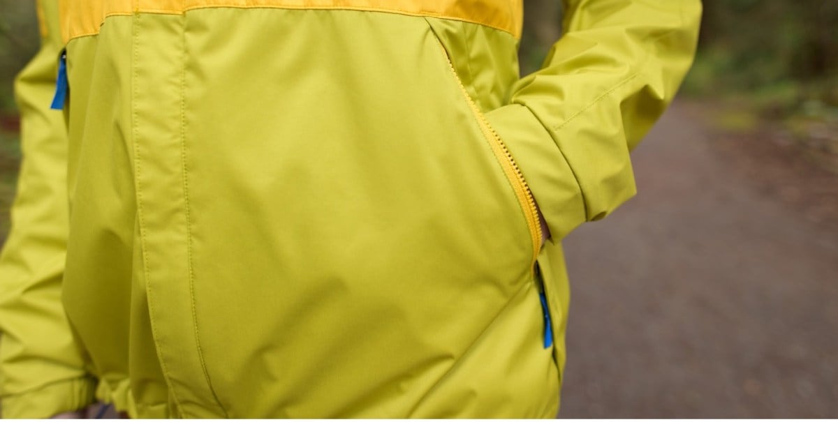 Detail of the lower pocket on the Trailmade rain jacket