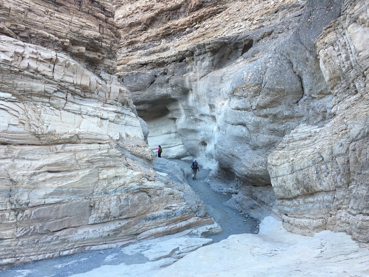 Hike a narrow canyon carved into polished marble and colorful mosaics of dolomite – giving it its name, Mosaic Canyon!