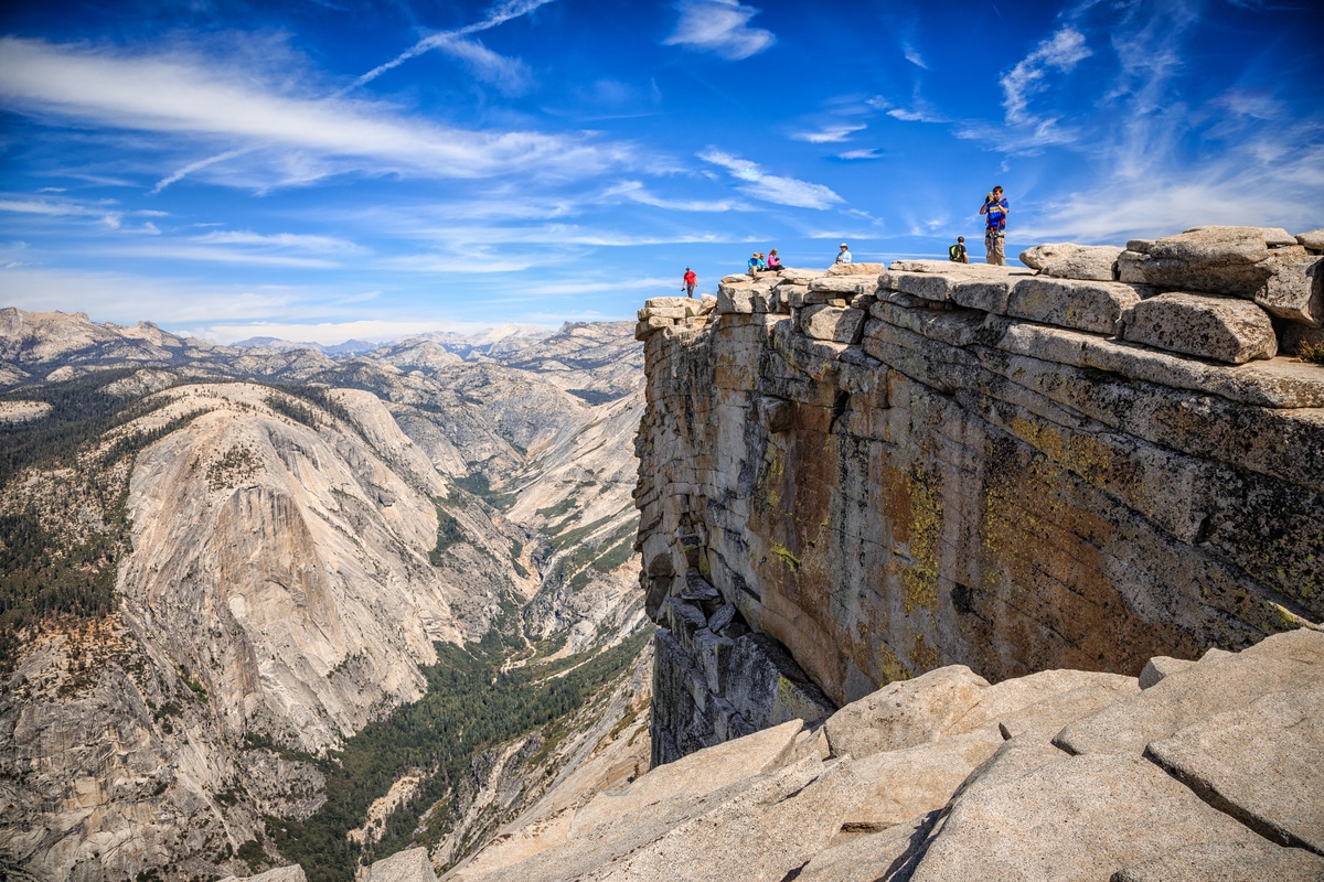 The culmination of your adventure, basking in the rarefied air at the top of Half Dome!