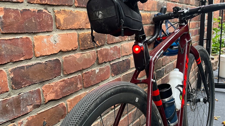 The taillight on a bike flashes red