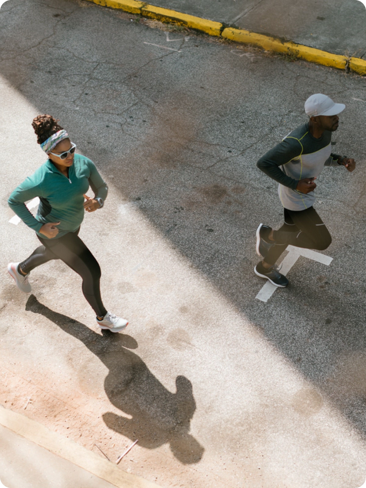 Runners on a city street.