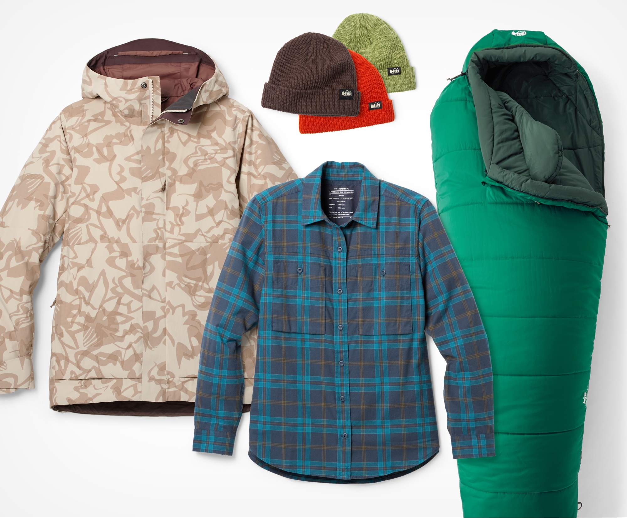 R E I Co-op brand jacket, shirt, beanies, and sleeping bag.