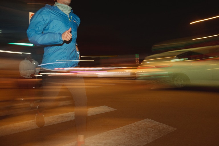 A runner in the Patagonia Houdini Jacket