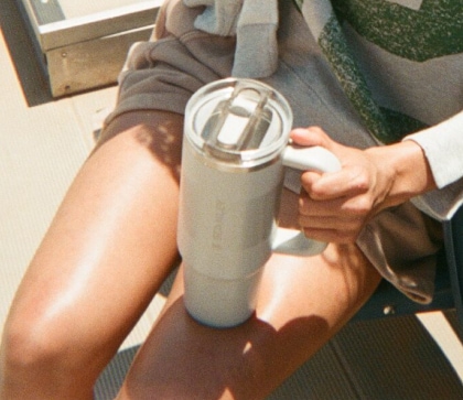 A person holding the new Stanley Quencher ProTour Flip Straw Tumbler.