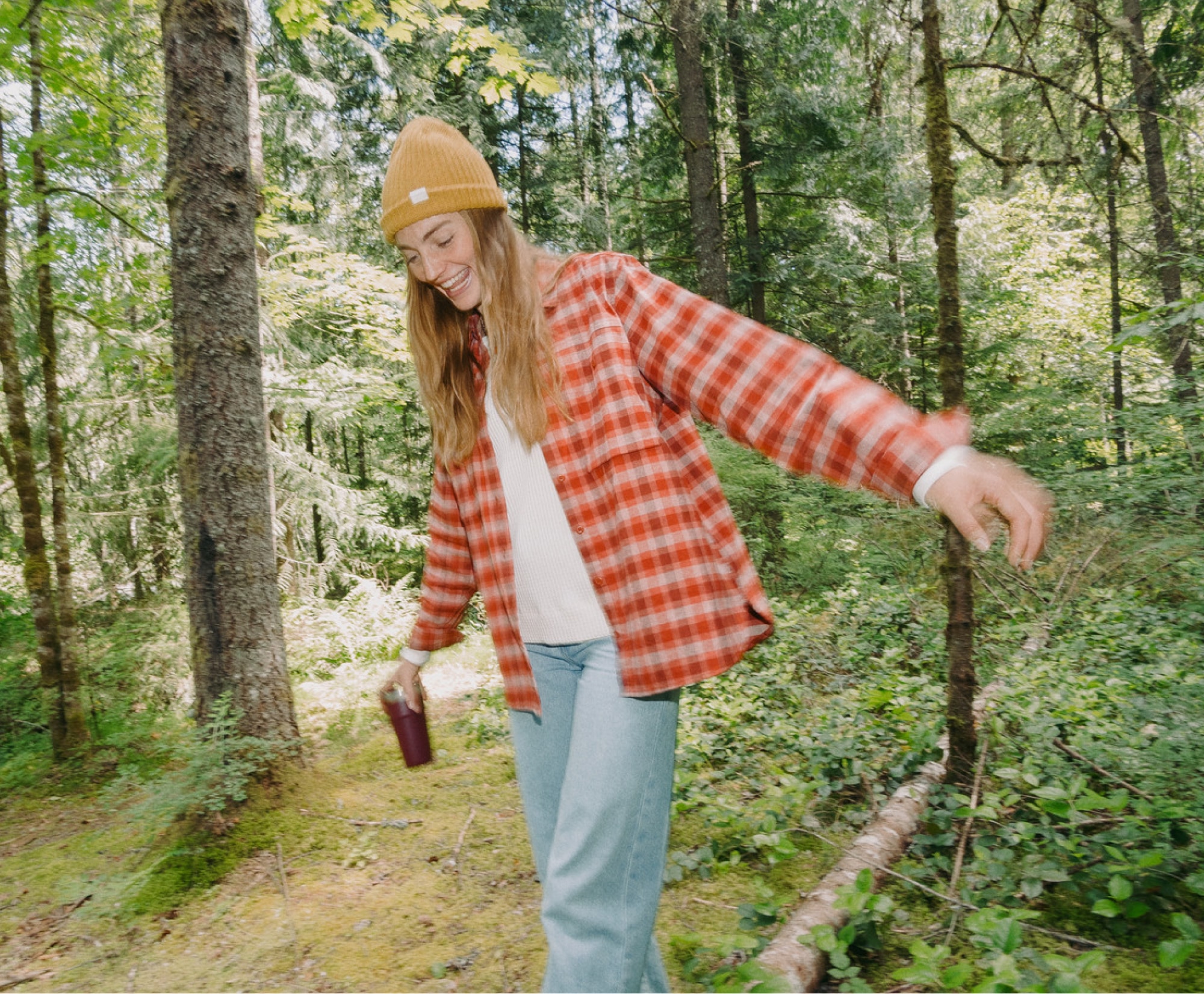 A person enjoying a walk in the forest.