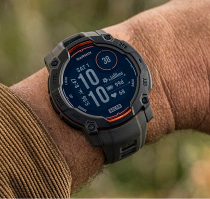 The Garmin Instinct 3 Solar being worn on a person's wrist.