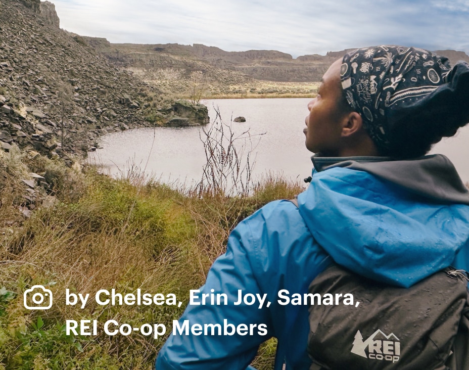 REI Co-op Members Chelsea, Erin Joy and Samara pause on a crisp fall hike to enjoy the vast landscape of a remote desert lake.