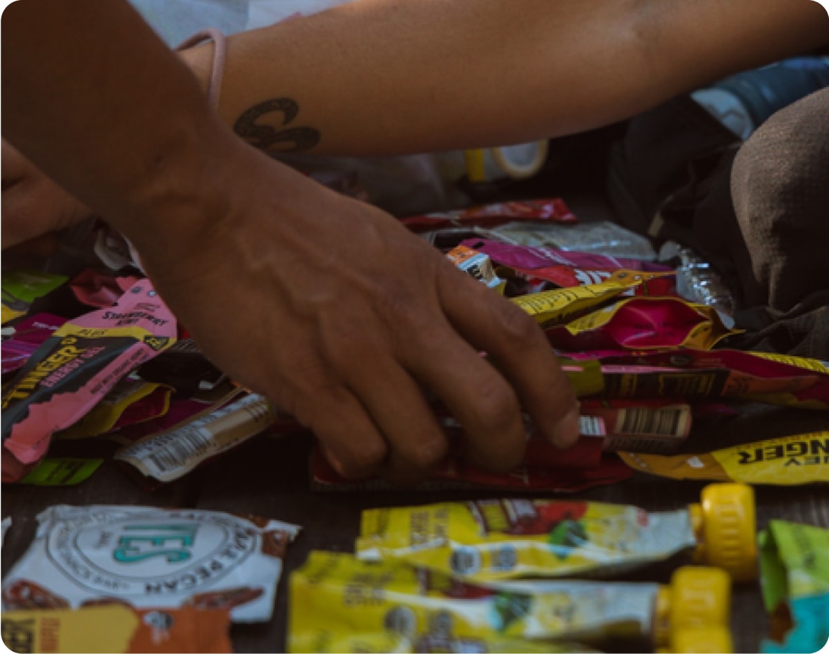 Two people organizing energy gels.