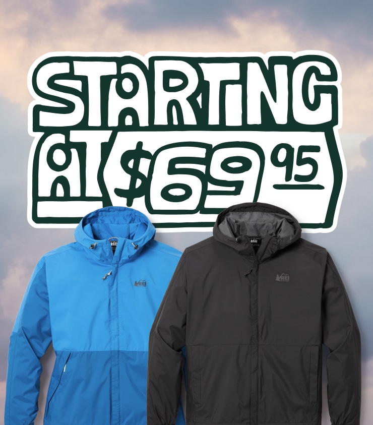 Black and blue REI Co-op Trailmade rain jackets. Headline: Starting at $69.95