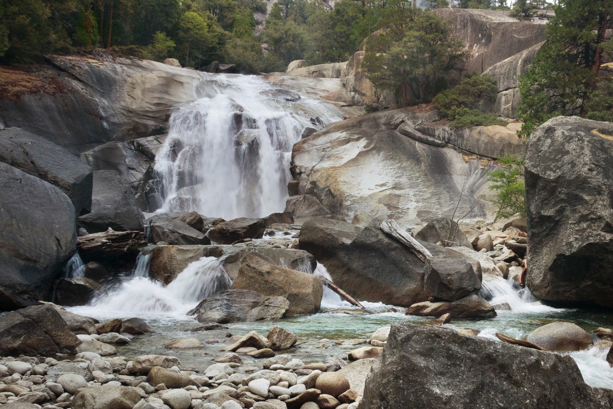 Descend into Kings Canyon along a rugged granite trail, through cedar and pine forests to the base of lovely Mist Falls.