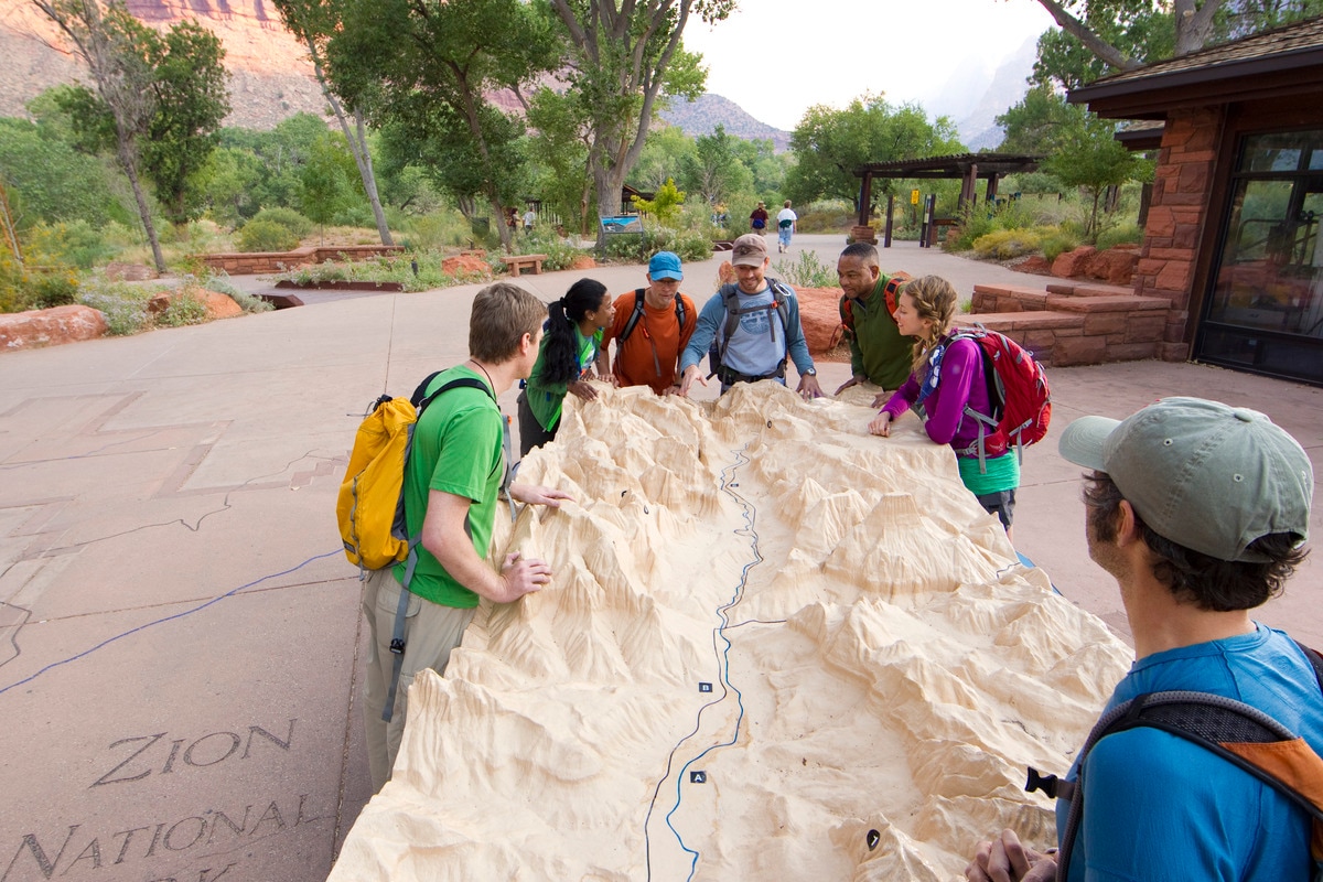 Our guides enlighten us on the remarkable geological history of Zion National Park and the Colorado Plateau.