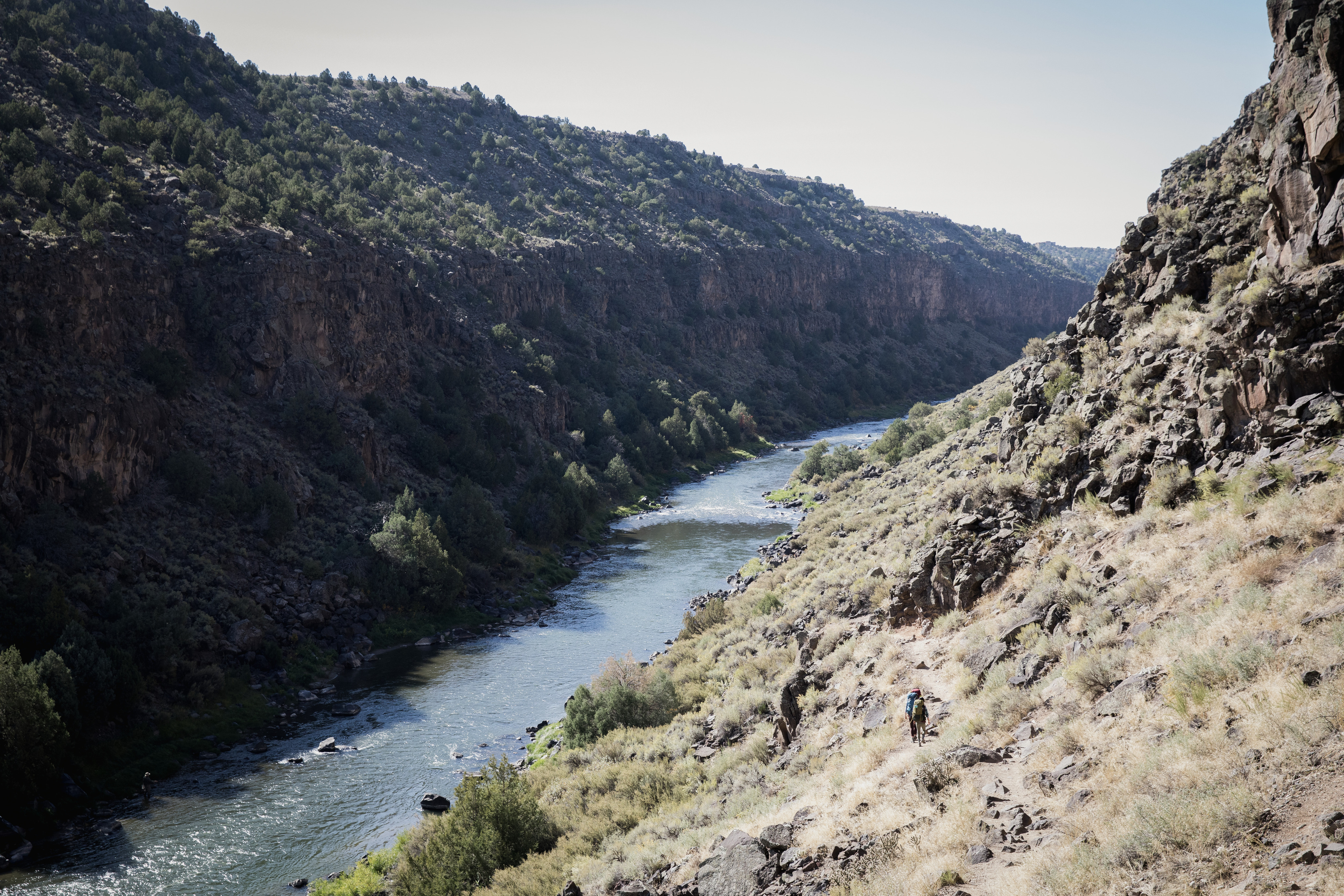 A rocky valley with a river running through