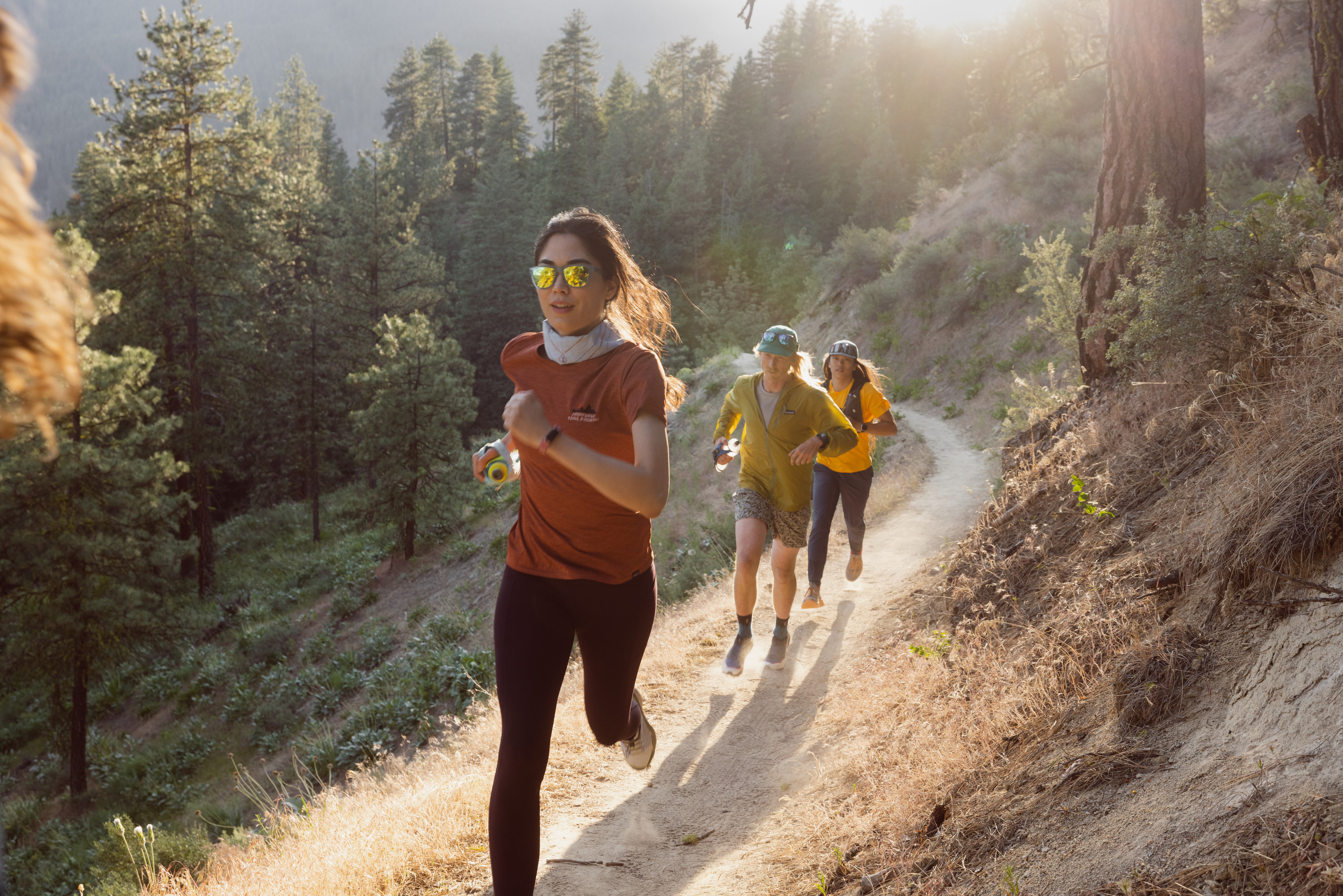 Trail runners with the wind in their face and sun on their back.