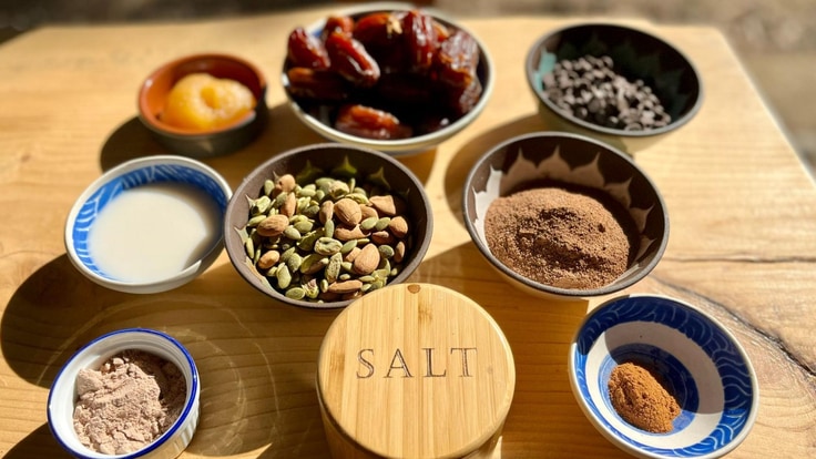 Protein bar ingredients laid out on a board.