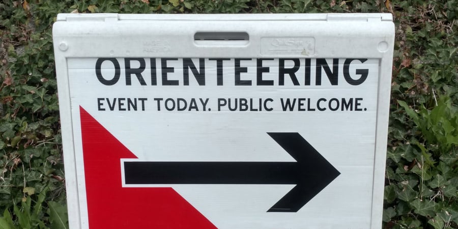 an orienteering event sign