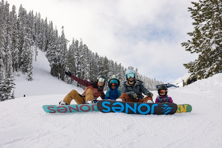 Family of snowboarders